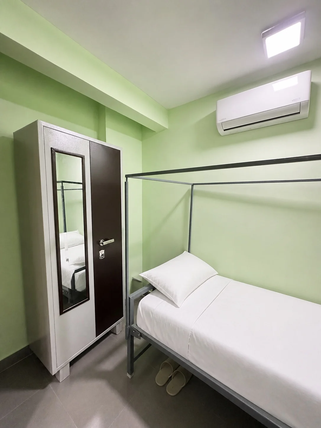 Furnished dormitory bed with wardrobe